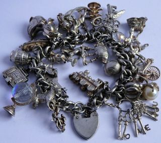 Fabulous Vintage Solid Silver Charm Bracelet & 29 Charms.  Opening,  Moving.  80.  1g