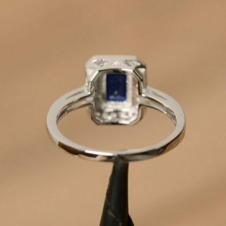 1.  3Ct Blue Sapphire Emerald Cut Diamond 14k White Gold Over Halo Engagement Ring 4