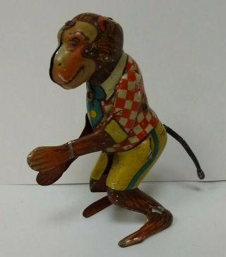 Vintage C.  K.  Metal Wind - Up Monkey