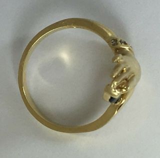 Stylized Ladies Hand Ring Holding Sapphire and Wearing Diamond Bracelet 14K Gold 8