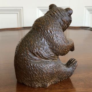 An Antique Charming Black Forest Carved Wood Bear,  19th Century.  13cm High. 3