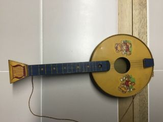 Vintage Tin Toy Banjo With Bears On The Base Shape With Strings