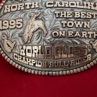 CHAMPION TROPHY RODEO BUCKLE VINTAGE 1995 RALEIGH NORTH CAROLINA BULL RIDER 141 5