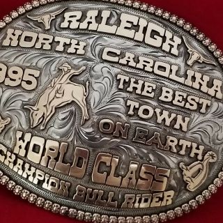 CHAMPION TROPHY RODEO BUCKLE VINTAGE 1995 RALEIGH NORTH CAROLINA BULL RIDER 141 8