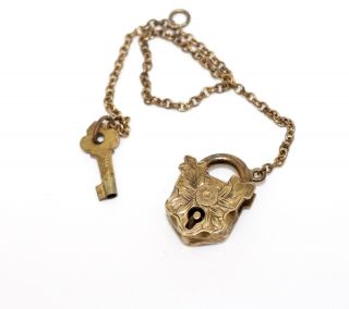 A Petite Antique Victorian Rolled Gold Padlock & Key Charm 12858