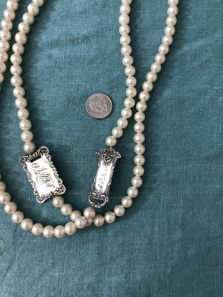 T.  Foree Sterling Luggage Tags Necklace - 70 " Pearl Flapper Length & Antique Tags