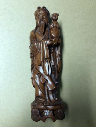 Chinese Hand Carved Wooden Statue Of Man HoldingA Child 2