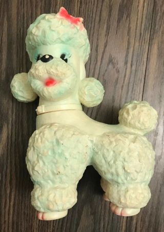 Vintage 1960s Sun Rubber Poodle Toy With Squeakers On Roller Ball Wheels