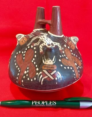 UNIQUE PRECOLUMBIAN NAZCA STIRRUP VESSEL w ANIMAL DESIGNS AND PROTRUDING HEADS. 2