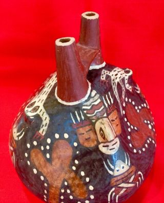 UNIQUE PRECOLUMBIAN NAZCA STIRRUP VESSEL w ANIMAL DESIGNS AND PROTRUDING HEADS. 7