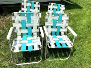 4 Vintage Aluminum Webbed Folding Chairs