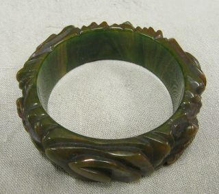 Heavily Carved Green Bakelite Bracelet