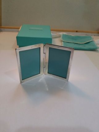 Minature Two Fold Tiffany & Co Sterling Silver Picture Frame Never Been.