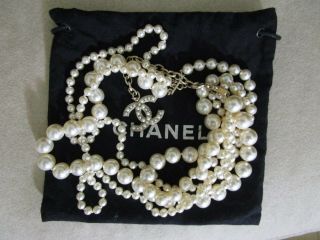 Vintage Chanel Quad Strand Pearl Necklace With Cc Logo Dangle Charm
