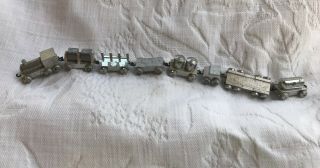 Gebr.  Hildner Miniature Vintage Aluminum Train Set (8 Cars).  Germany