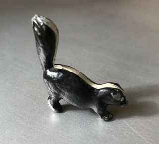 Vintage Miniature Cast Iron Skunk Figurine - Paint 2