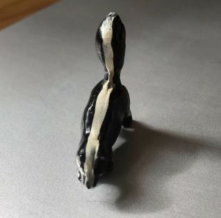Vintage Miniature Cast Iron Skunk Figurine - Paint 4