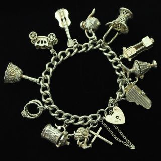 Heavy 1976 Vintage Sterling Silver Charm Bracelet With 11 Charms & Heart Padlock