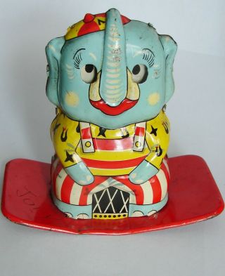 Vintage 4 1/2” Tin “rocking” Elephant Toy
