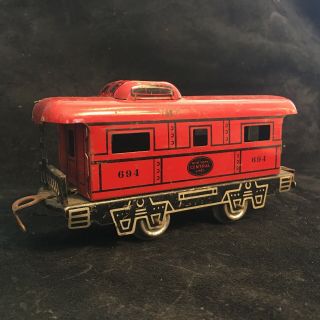 (a) Vintage Tin Toy Train Caboose 694 York Central Lines Red Caboose Tin Toy