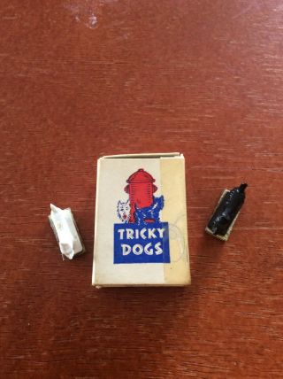 Vtg 1950s Tricky Dogs Plastic Magnet Black White Terrier Magic Trick