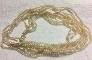 Natural Seed Pearl Necklace With Yellow Gold Clasp With 3 Mine Cut Diamonds