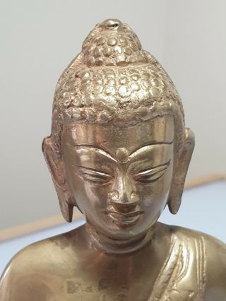 A Qing Dynasty Tibetan Gilt Bronze Figure Of Buddha. 6