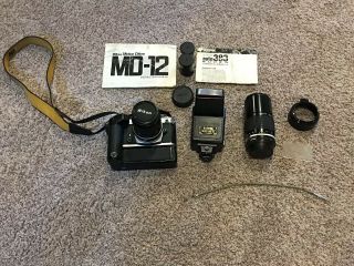 Nikon Fe Camera,  Motor Drive,  Extra 200 Mm Lens,  Bag And Accessories