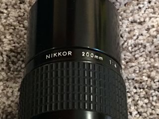 Nikon FE Camera,  Motor drive,  extra 200 mm lens,  Bag and Accessories 7