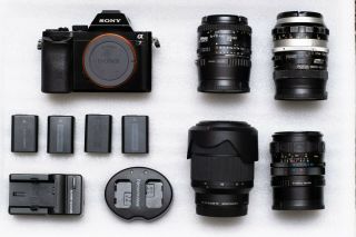 Sony A7 Body w/ 28 - 70mm,  Vintage Lens Bundle (50mm F1.  4,  50mm F1.  8,  24mm F2.  8) 2