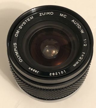 Olympus Om - System E.  Zuiko Mc Auto - W 21mm F2 Lens With Caps Rare