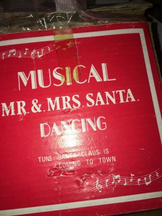 Vintage Dancing Mr & Mrs Santa Wind Up No.  410 Hong Kong " Plays Santas Coming