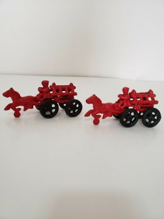 Two Vintage Cast Iron Toy Red Firetrucks Pulled By Horses
