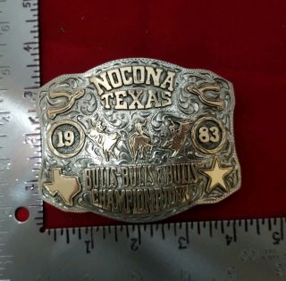 RODEO BUCKLE VINTAGE 1983 NOCONA TEXAS BULL RIDING CHAMP.  SIGNED Engraved 747 2