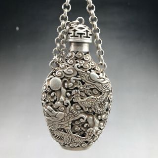 Ancient Tibetan Silver Snuff Bottles Are Carved By Hand With Dragon Designs