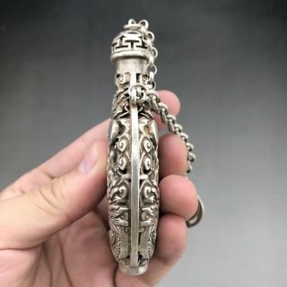 Ancient Tibetan silver snuff bottles are carved by hand with dragon designs 5