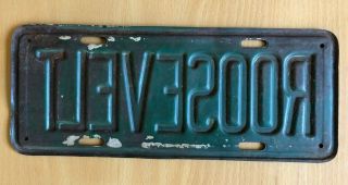 Vintage Roosevelt Metal License Plate Tag Topper 12 