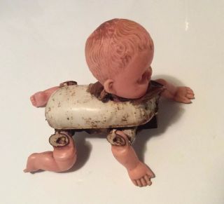 Antique/vintage 1920’s Era Celluloid & Tin Crawling Creepy Baby Doll Toy