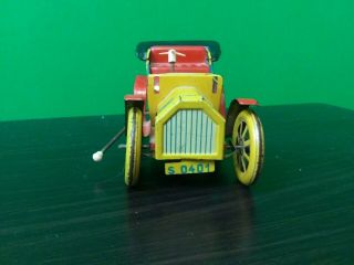 Yellow Vintage Model R Ford Tin Friction Lever Action Toy Car