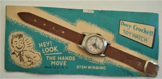 Vintage 1950s Davy Crockett Toy Watch.  Still On Card.  Round Shape