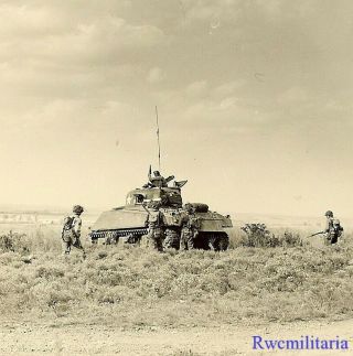Port.  Photo: Best Us Infantry Supporting M4 Sherman Tank In Open Desert