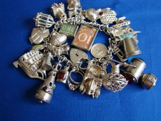 Vintage Silver Charm Bracelet With 27 Rare Charms.  117.  6g