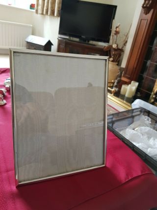 An A.  E.  Jones Large Solid Silver,  Photo Frame