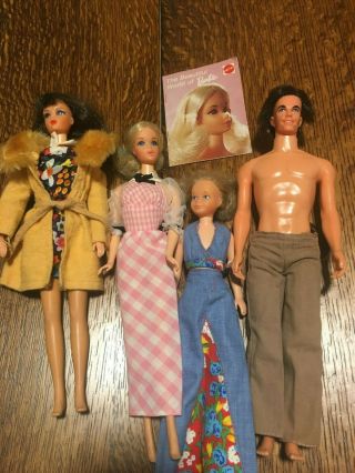 Four Vintage Barbies With Assorted Clothing,  Shoes,  And Barbie Doll Trunk