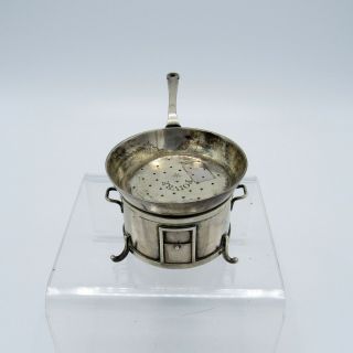 Antique French Silver Tea Strainer In The Shape Of A Skillet On A Burner