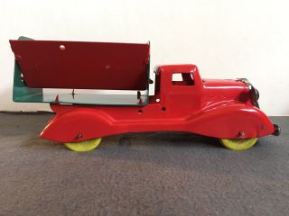 Rare vintage Wyandotte Pressed Steel Side Dumper Dump Truck,  10.  5” long. 4