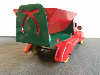 Rare vintage Wyandotte Pressed Steel Side Dumper Dump Truck,  10.  5” long. 7