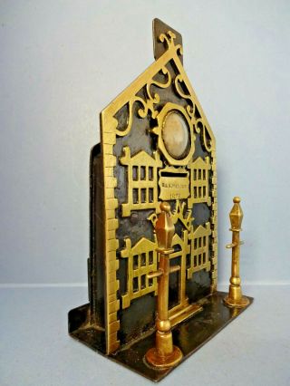 ANTIQUE VICTORIAN BRASS / IRON BANK MONEY BOX WITH CENTRAL CLOCK,  c 1878. 5