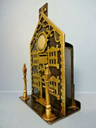 ANTIQUE VICTORIAN BRASS / IRON BANK MONEY BOX WITH CENTRAL CLOCK,  c 1878. 6