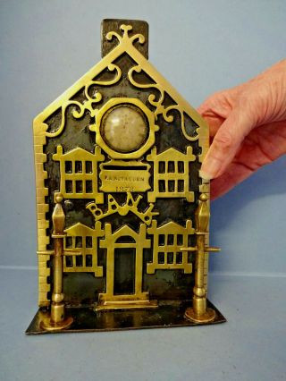 ANTIQUE VICTORIAN BRASS / IRON BANK MONEY BOX WITH CENTRAL CLOCK,  c 1878. 9
